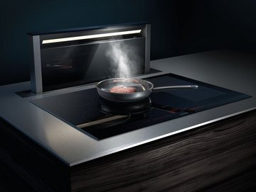 Smarte Abzugshaube, fährt beim Kochen aus und zieht Dampf ab